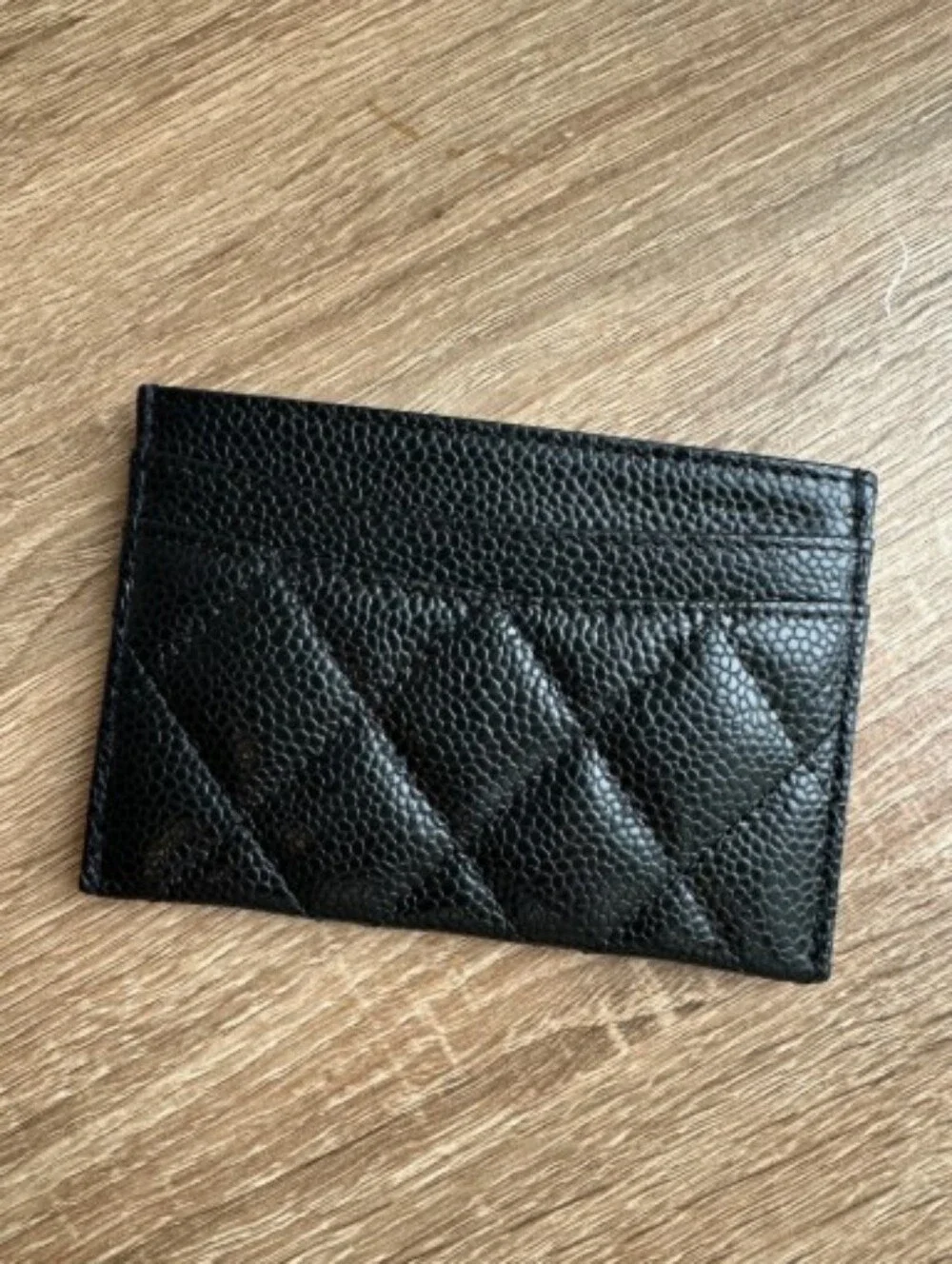 CHANEL Black Quilted Caviar Leather Card Sleeve with Gold CC Emblem